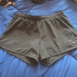 Black Nike running shorts